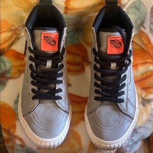 Vans Gray and Black High-Tops with Orange Logo
